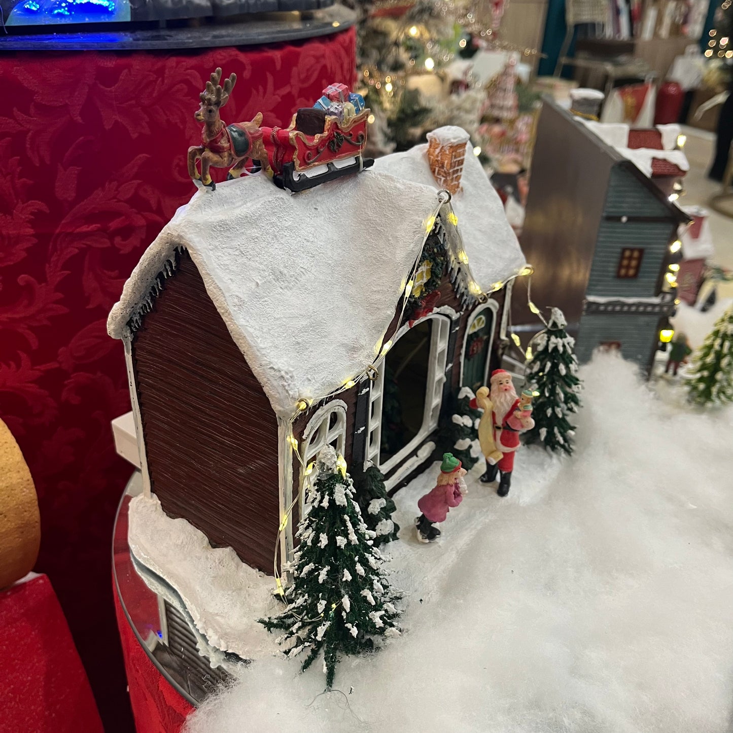 Giostrina Casa di Babbo Natale con Slitta sul Tetto