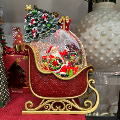 Decoro Slitta e Paesaggio Innevato con Musica, Movimento e Luci Led