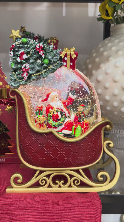 Decoro Slitta e Paesaggio Innevato con Musica, Movimento e Luci Led